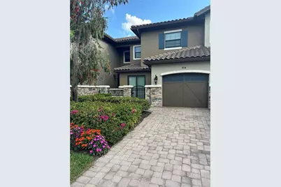 8756 Bellano Ct #1-104, Naples, FL 34119 - Photo 1