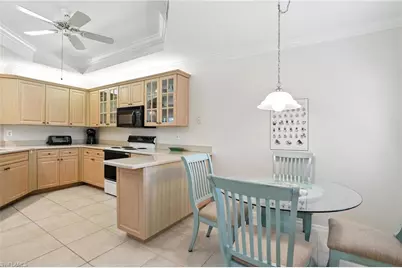 7032 Pelican Bay Blvd #E304, Naples, FL 34108 - Photo 14