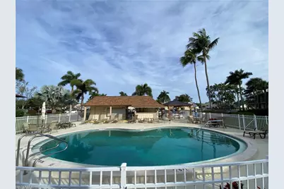 25398 Golf Lake Cir #205, Bonita Springs, FL 34135 - Photo 1