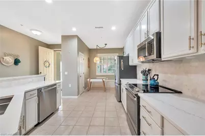4833 Hampshire Ct #302, Naples, FL 34112 - Photo 6
