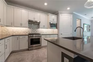 6902 Winding Cypress Dr, Naples, FL 34114 - Photo 10