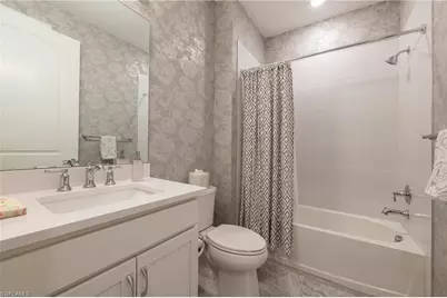 6902 Winding Cypress Dr, Naples, FL 34114 - Photo 18