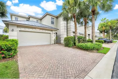 9018 Whimbrel Watch Ln #101, Naples, FL 34109 - Photo 1