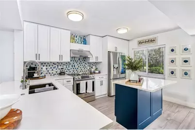 3001 Sandpiper Bay Cir #B105, Naples, FL 34112 - Photo 8