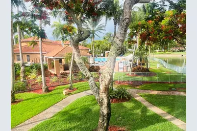 1275 Wildwood Lakes Blvd #202, Naples, FL 34104 - Photo 6
