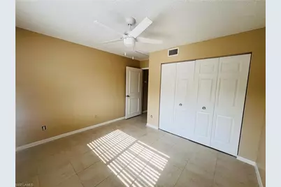 1275 Wildwood Lakes Blvd #202, Naples, FL 34104 - Photo 10