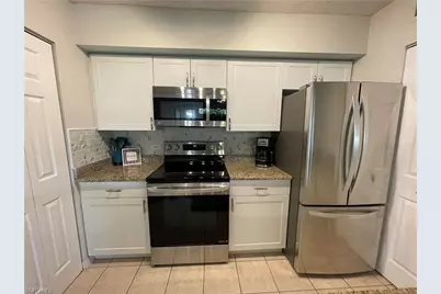 8870 Colonnades Ct W #312, Bonita Springs, FL 34135 - Photo 2