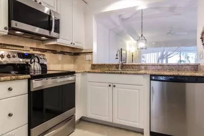 1044 Woodshire Ln #B210, Naples, FL 34105 - Photo 4