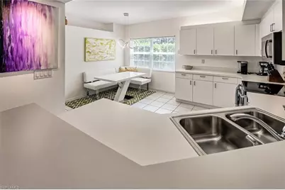 6910 Satinleaf Rd N #101, Naples, FL 34109 - Photo 8
