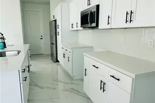 733 Knox Ave S, Lehigh Acres, FL 33974 - Photo 6