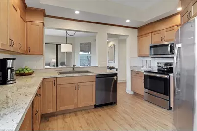 7008 Pelican Bay Blvd #H302, Naples, FL 34108 - Photo 12