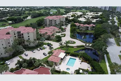 7008 Pelican Bay Blvd #H302, Naples, FL 34108 - Photo 6