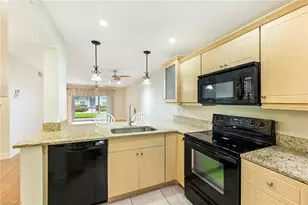 1933 Courtyard Way, Naples, FL 34112 - Photo 8