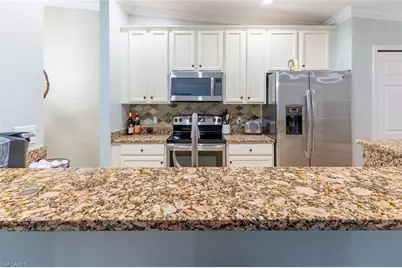 9828 Venezia Cir #1124, Naples, FL 34113 - Photo 12