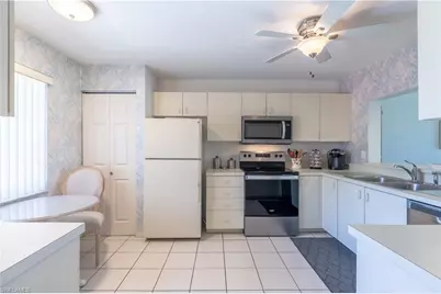 725 Saratoga Cir #A204, Naples, FL 34104 - Photo 8