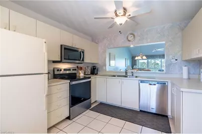 725 Saratoga Cir #A204, Naples, FL 34104 - Photo 10