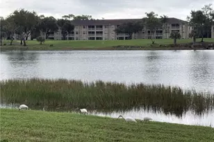 2820 Cypress Trace Cir, Naples, FL 34119 - Photo 16