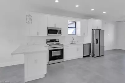 312 Progress Ave, Lehigh Acres, FL 33974 - Photo 1