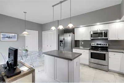 11626 Quail Village Way, Naples, FL 34119 - Photo 12