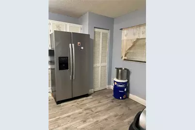 653 Squire Cir #101, Naples, FL 34104 - Photo 12