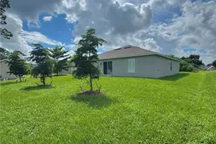 3014 38th St SW, Lehigh Acres, FL 33976 - Photo 4