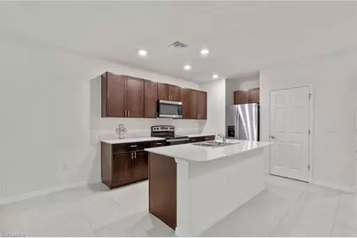 15535 Wildflower Cir, Naples, FL 34119 - Photo 8