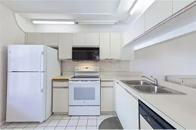 1965 Courtyard Way #E206, Naples, FL 34112 - Photo 2