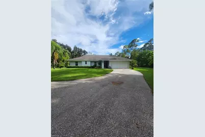 5930 Spanish Oaks Ln, Naples, FL 34119 - Photo 2
