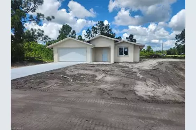 875 Cervantes St E, Lehigh Acres, FL 33974 - Photo 1
