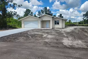 875 Cervantes St E, Lehigh Acres, FL 33974 - Photo 1