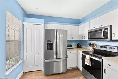 1295 Sweetwater Cv #8104, Naples, FL 34110 - Photo 6