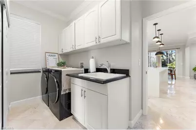 2384 Heritage Greens Dr, Naples, FL 34119 - Photo 42