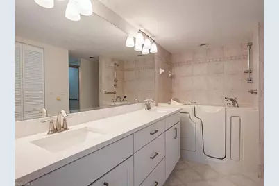 6371 Pelican Bay Blvd #N3, Naples, FL 34108 - Photo 6