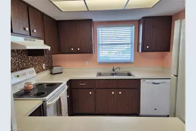 300 Valley Stream Dr #D-5, Naples, FL 34113 - Photo 2