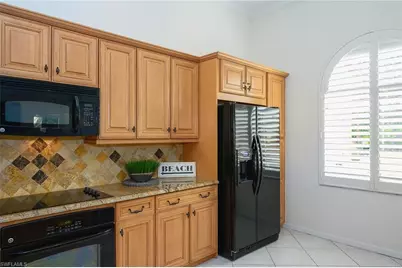 613 Beachwalk Cir #J-204, Naples, FL 34108 - Photo 14