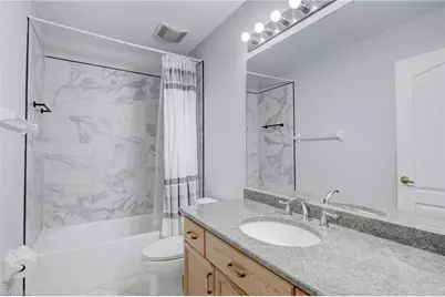 25680 Springtide Ct, Bonita Springs, FL 34135 - Photo 20