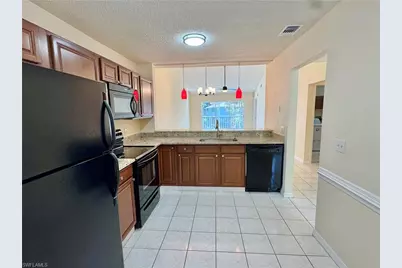 5665 Whitaker Rd #A-201, Naples, FL 34112 - Photo 12