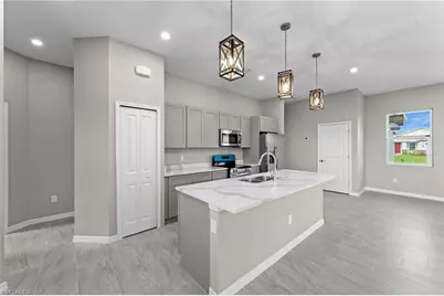 1311 NW Juanita Pl, Cape Coral, FL 33993 - Photo 6