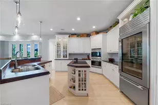 12901 Pond Apple Dr E, Naples, FL 34119 - Photo 8