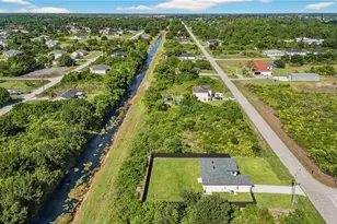 884 Chemstrand St E, Lehigh Acres, FL 33974 - Photo 36