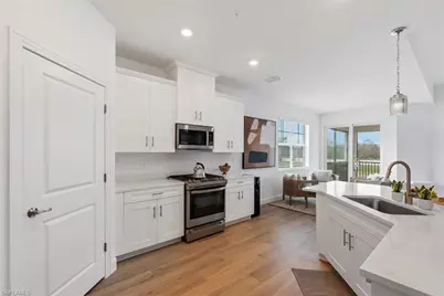 16889 Fairgrove Way #5-201, Naples, FL 34110 - Photo 6