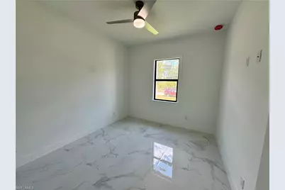 1012 Louis Ave, Lehigh Acres, FL 33972 - Photo 26