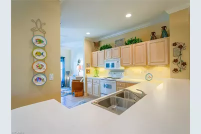 1015 Tarpon Cove Dr #1403, Naples, FL 34110 - Photo 12