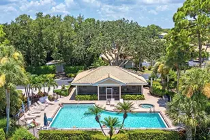 306 Emerald Bay Cir, Naples, FL 34110 - Photo 1