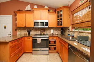 306 Emerald Bay Cir, Naples, FL 34110 - Photo 32