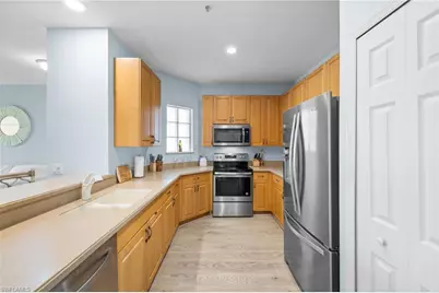 1305 Sweetwater Cv #104, Naples, FL 34110 - Photo 12