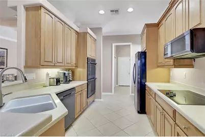 3670 Grand Cypress Dr, Naples, FL 34119 - Photo 14