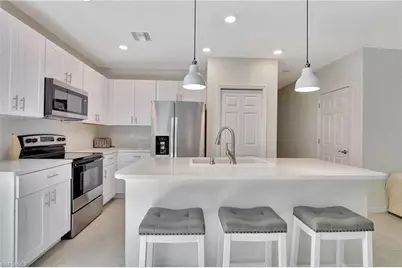 15489 Wildflower Cir, Naples, FL 34119 - Photo 14