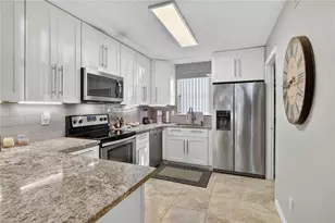 2142 Arbour Walk Cir, Naples, FL 34109 - Photo 12