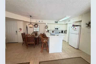 1220 Wildwood Lakes Blvd #105, Naples, FL 34104 - Photo 1